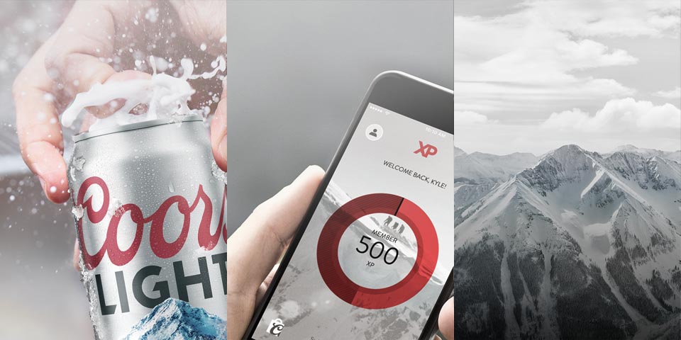 Hand holding a can of Coors, another hand holding a mobile phone with the app on it, and a picture of majestic mountain